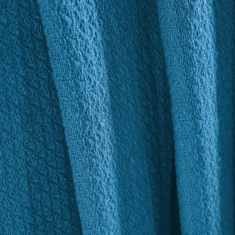 Blue bed throw