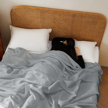 Grey waffle bed throw