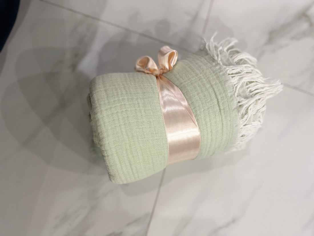 Green muslin throw